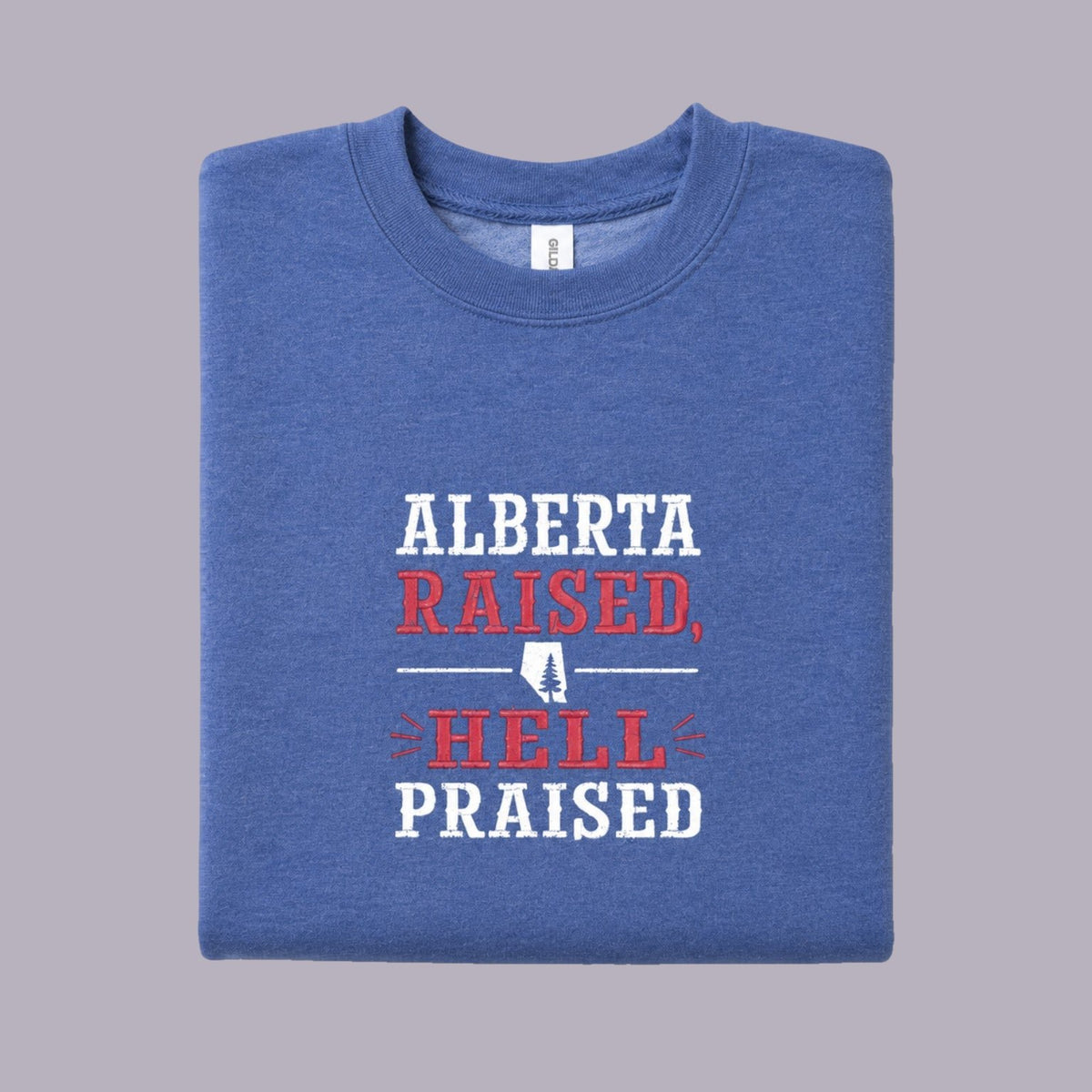 Alberta Raised, Hell Praised Embroidered Crewneck — Blue — product view on grey-purple background