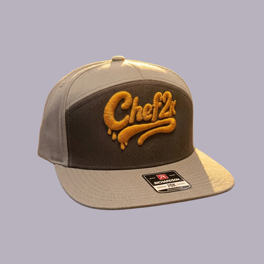 Chef2K Embroidered Snapback — product view on grey-purple background