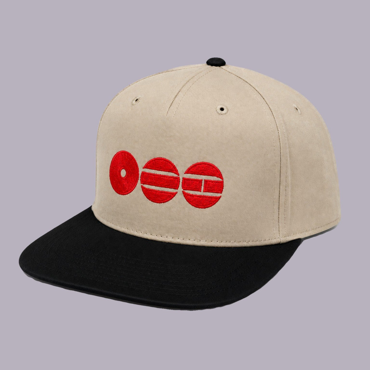 BTS Embroidered Hat — Cream & Black — product view on grey-purple background
