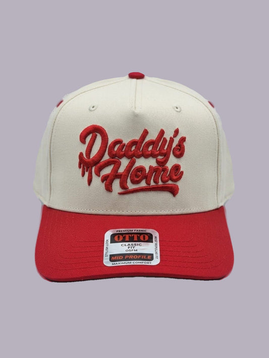 Daddy’s Home Embroidered Hat — Cream & Red — product view on grey-purple background