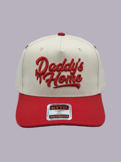 Daddy’s Home Embroidered Hat — Cream & Red — product view on grey-purple background