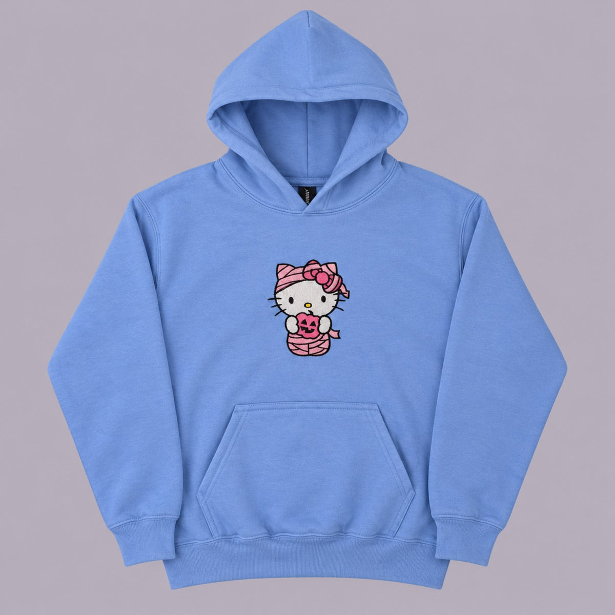 Blue youth hoodie with pink Hello Kitty mummy embroidery holding a pumpkin