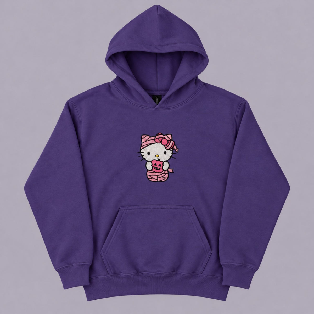 Purple Gildan 18500B youth hoodie with pink Hello Kitty mummy embroidery