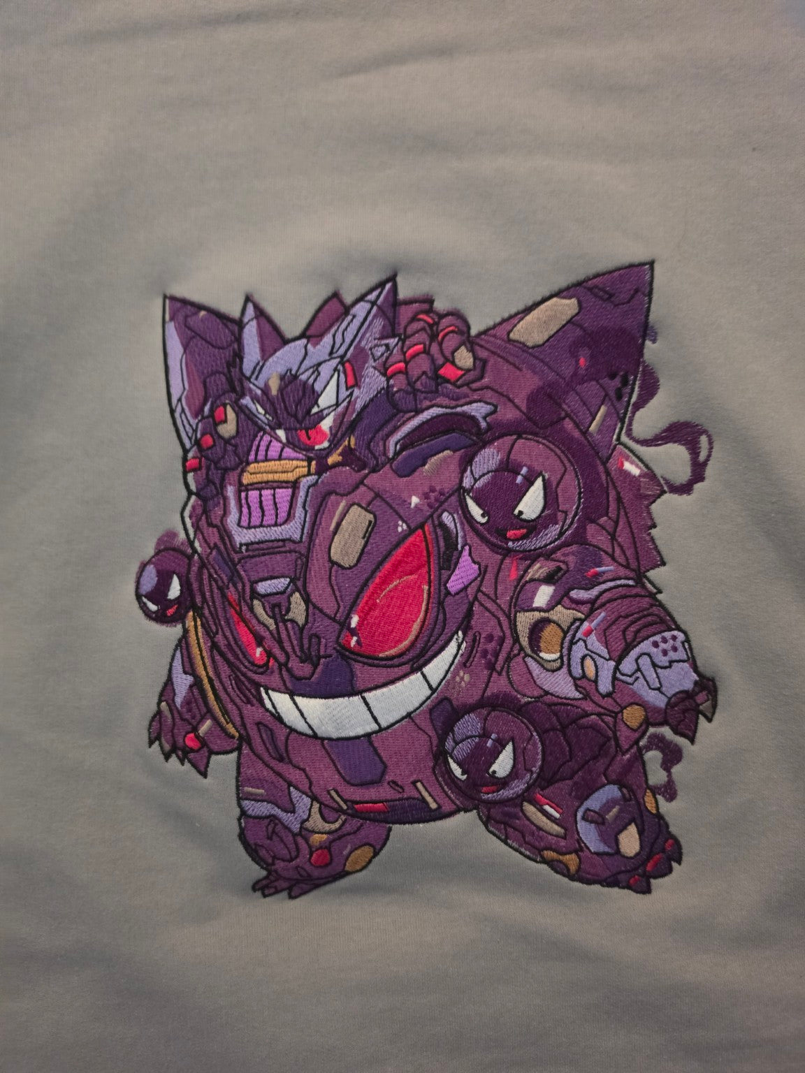 Close-up of the 163,000-stitch Mecha Gengar embroidery
