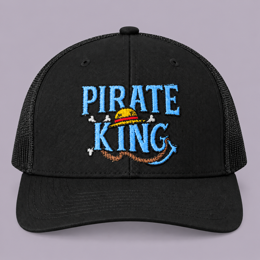 Black Pirate King Richardson 112 trucker hat with blue embroidered lettering and yellow straw hat detail