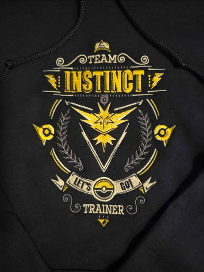 team-instinct-crest-embroidery-detail-gold-yellow-zapdos-trainer-badge