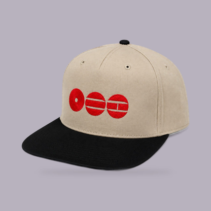BTS Embroidered Hat — Cream & Black — product view on grey-purple background