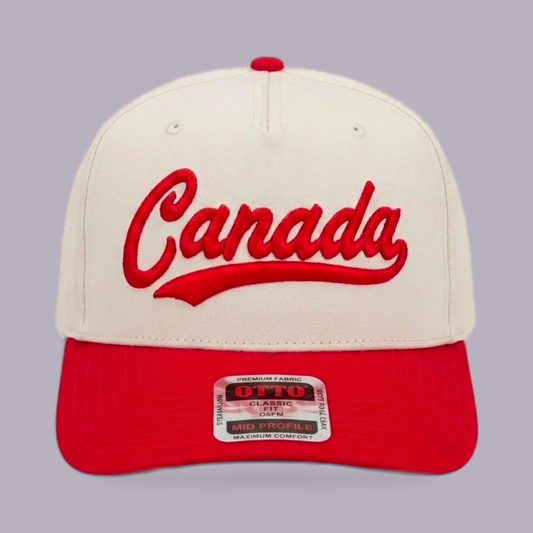 Canada Script Snapback Hat — Cream & Red 3D Puff Embroidered Cap — product view on grey-purple background
