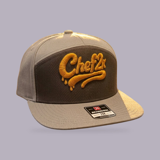 Chef2K Embroidered Snapback — product view on grey-purple background